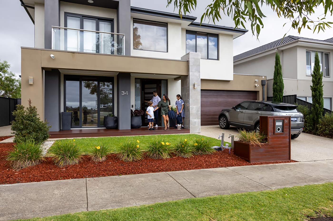 Image: Aston Craigieburn family leaving residence