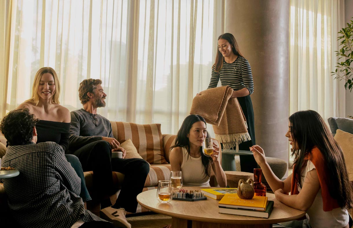 Image: Home Docklands group of people socialising