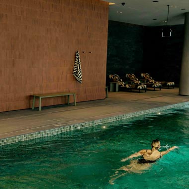 Image: Home Docklands woman swimming in pool